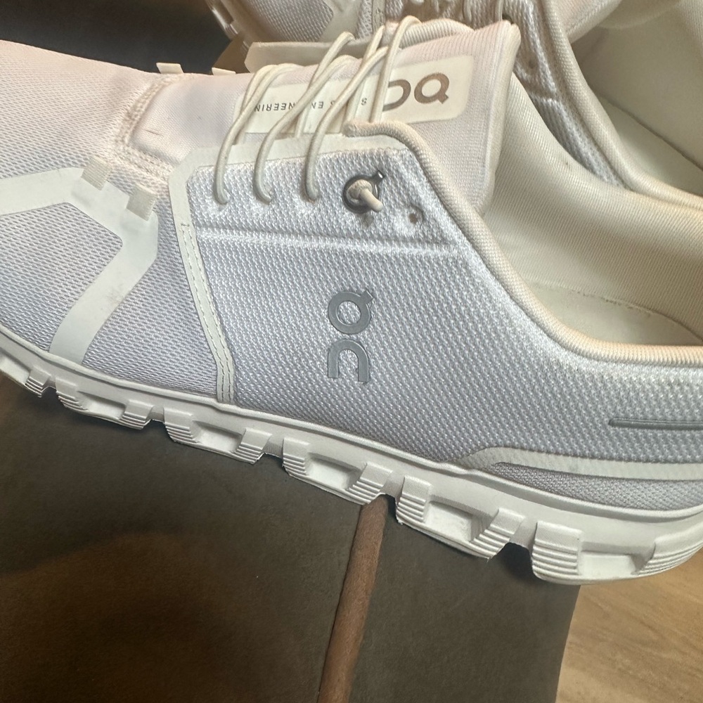 On Running All-White Athletic Shoes